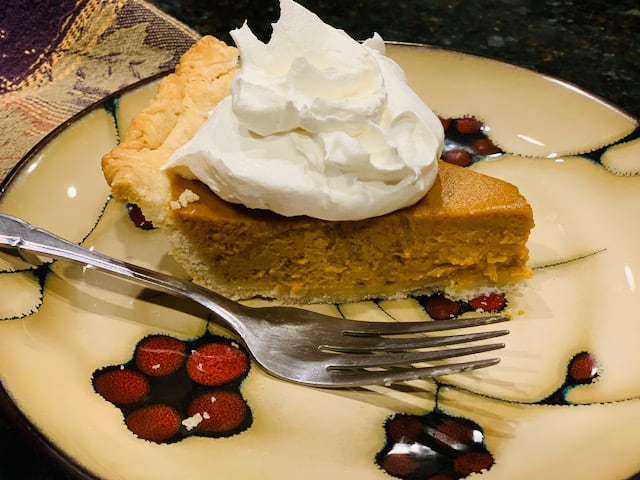 Pumpkin pie with whip topping