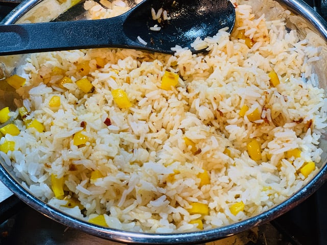 Spicy sesame coconut rice in a sauté pan.